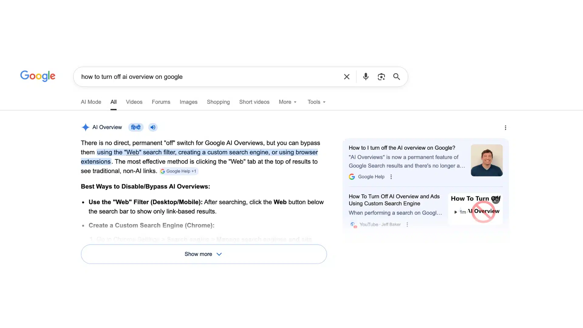 Laptop screen showing Google search results with AI overview still appearing above standard links