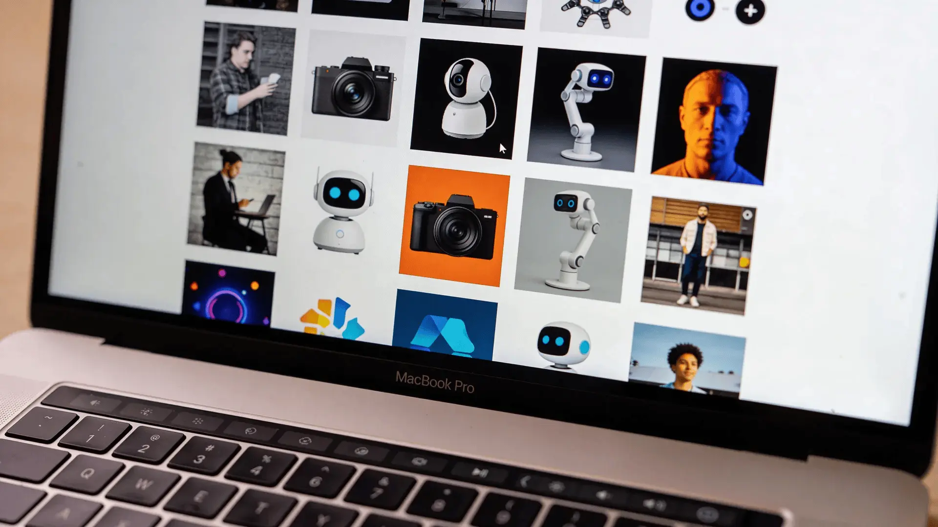 Laptop screen showing a grid of varied AI-generated images in different styles