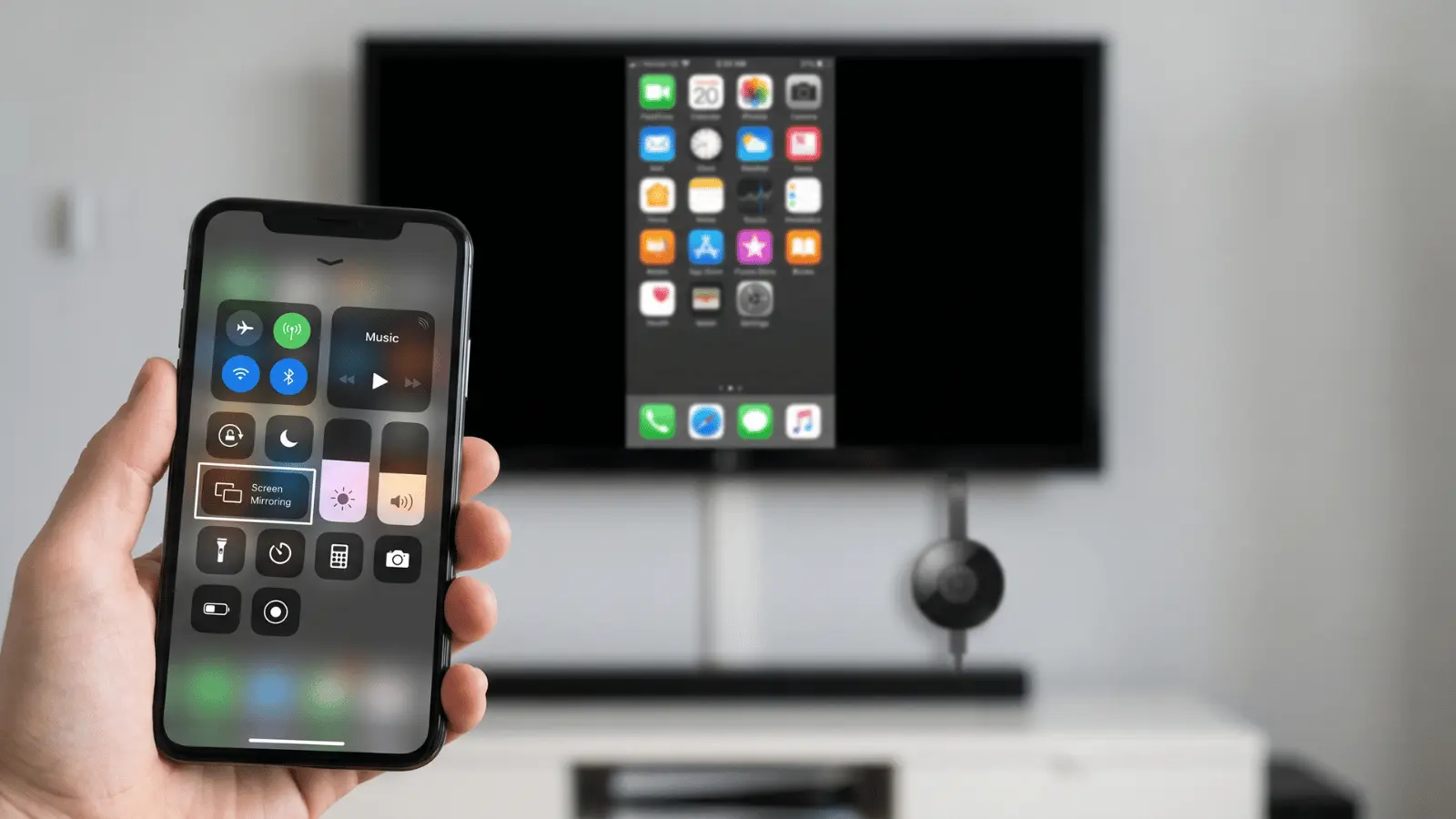 iPhone mirroring its screen to a Chromecast device with TV displaying same content