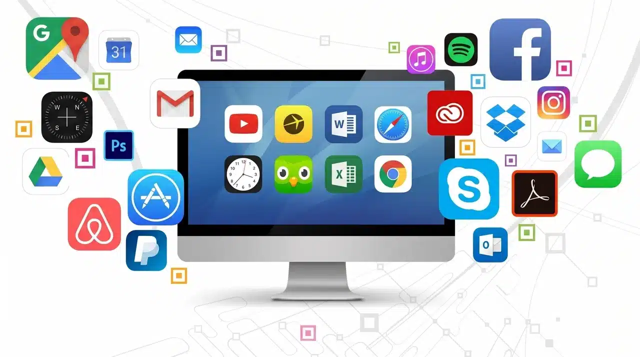 Desktop computer monitor surrounded by multiple application icons floating outward on a white background.