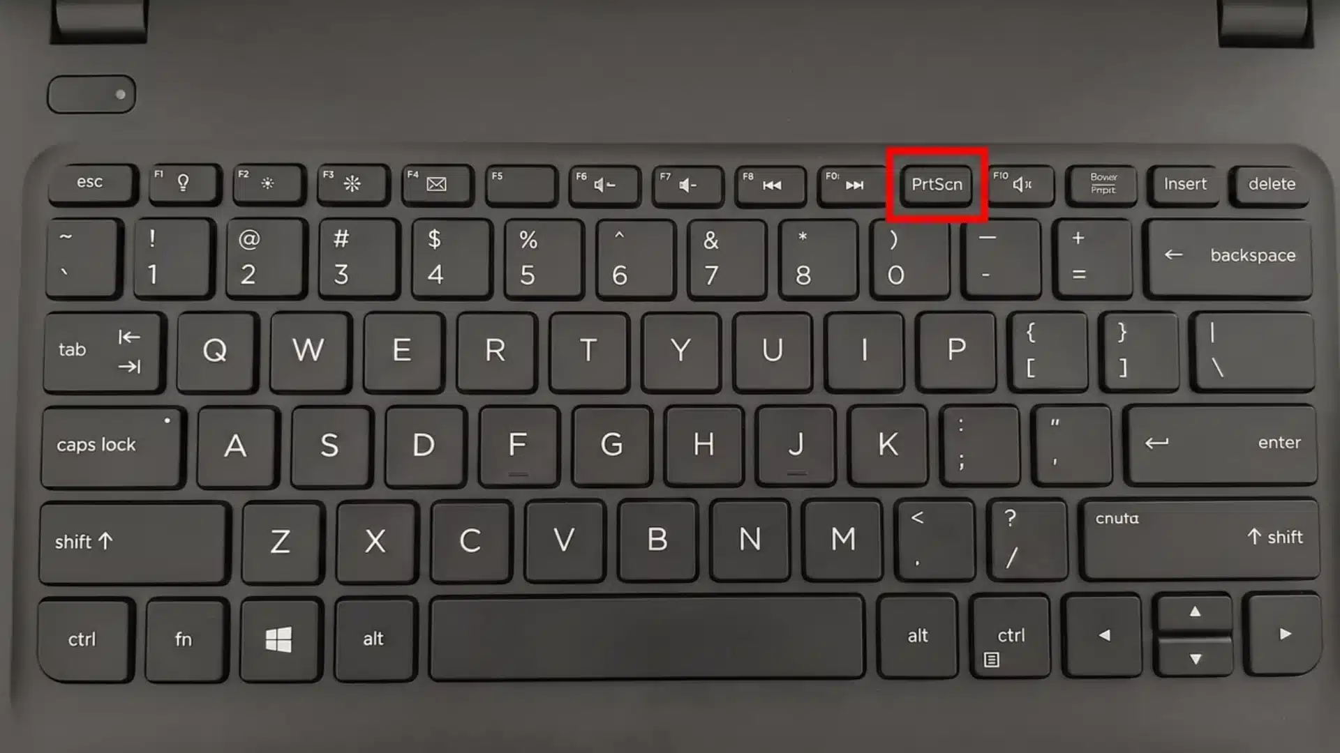 Dell keyboard showing the PrtScn key location for full-screen clipboard screenshot.