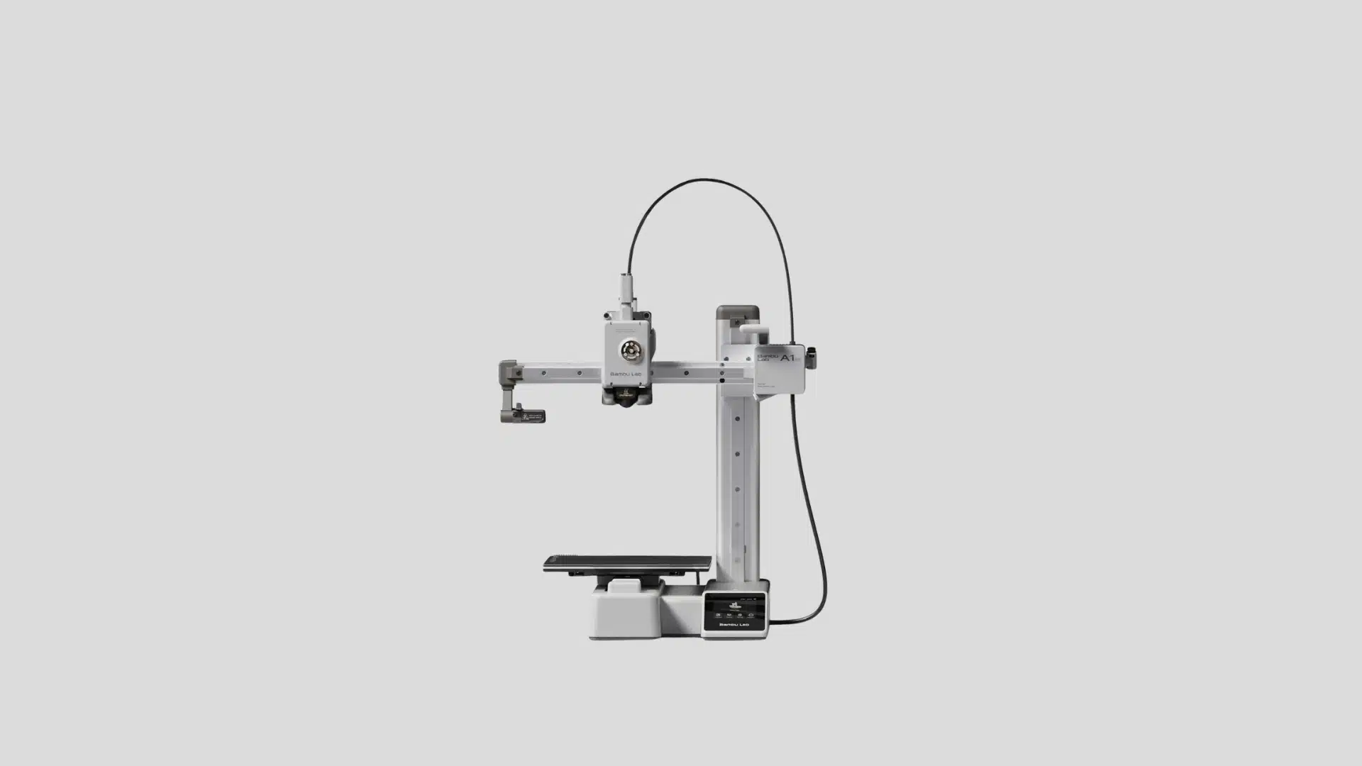 Bambu Lab A1 3D printer with open-frame design, print bed, toolhead, and filament tube