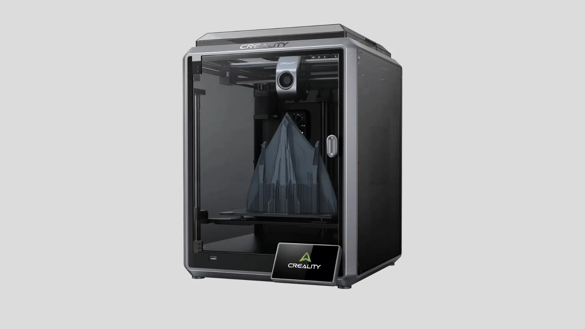 Creality K1 Max enclosed 3D printer with a large geometric model on the print bed and front touchscreen