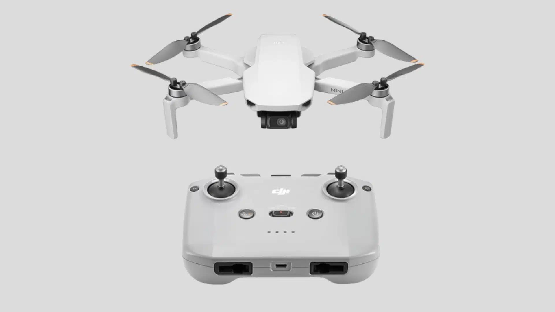 DJI Mini 4K camera drone with four propellers and remote controller