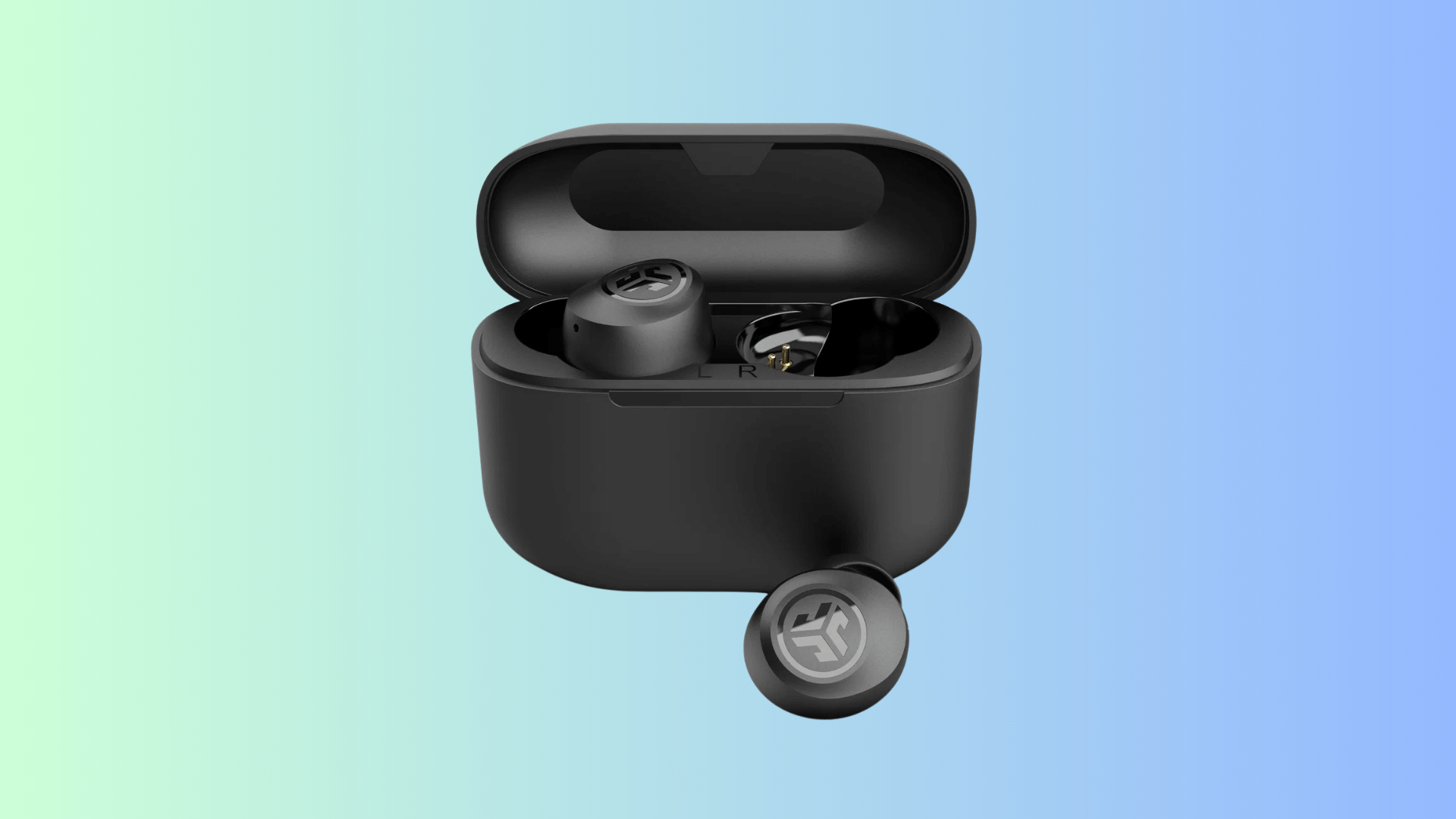 JLab GO Air Pop earbuds with one earbud inside an open charging case and one placed in front.