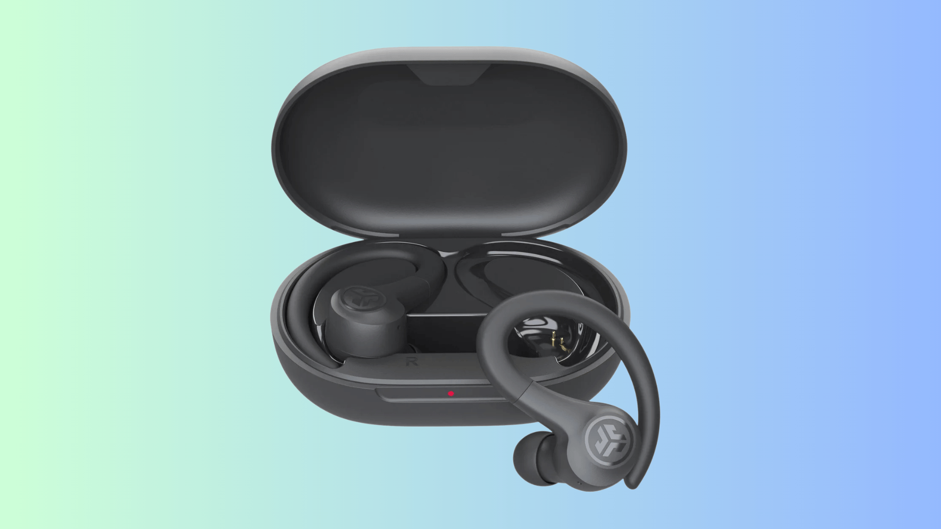JLab GO Air Sport earbud with ear hook beside an open charging case holding two earbuds.