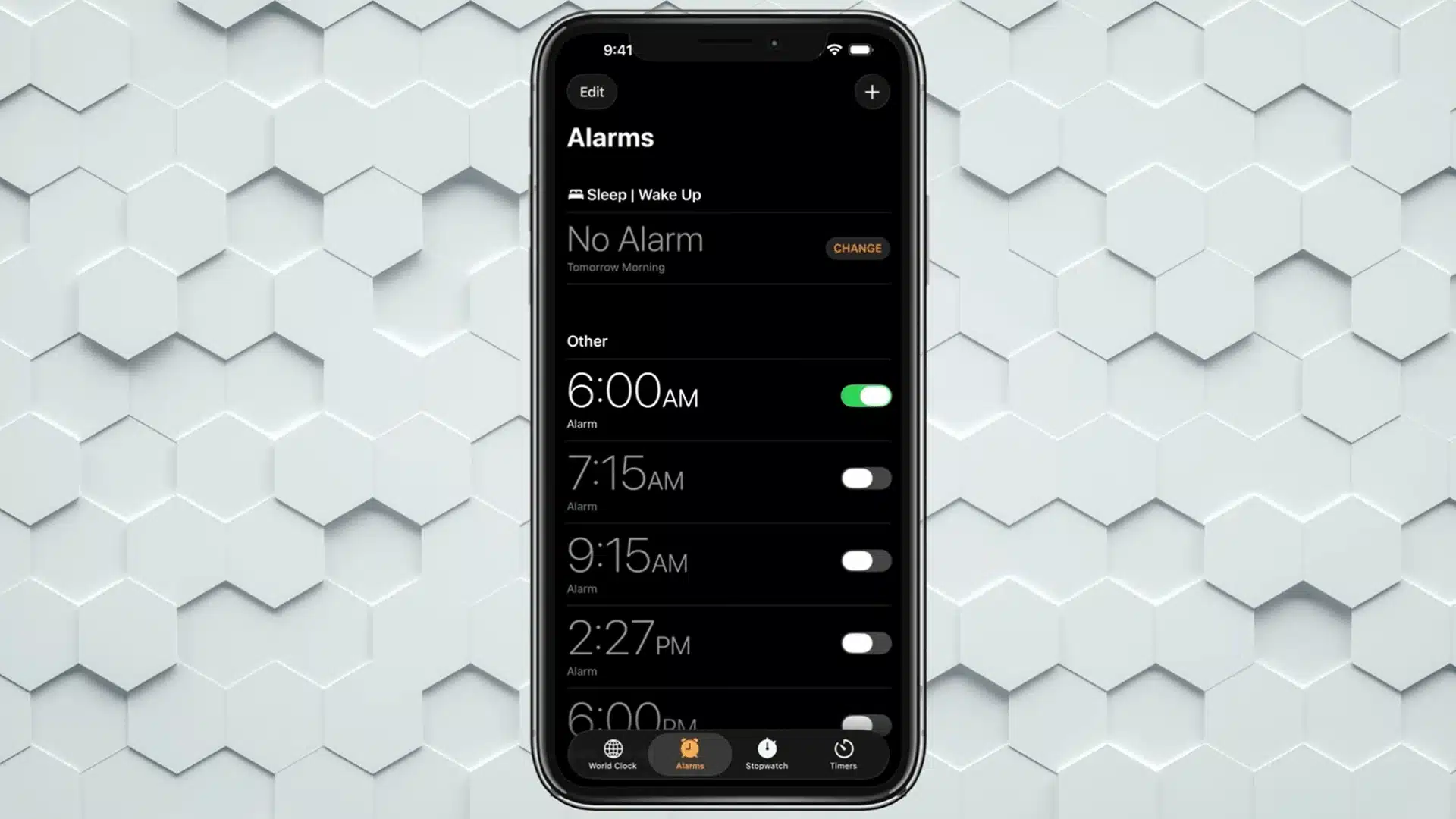 iPhone Clock app displaying multiple alarms with toggle switches enabled.